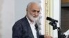 Iran -- Hassan Amini, religious figure and religious judges in Iranian region of Kurdistan. 