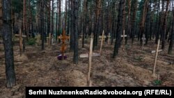 Массовое захоронение в Изюме