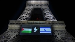 Fotografie care prezintă imagini ale steagurilor palestinian (stânga) și israelian (dreapta) proiectate pe Turnul Eiffel. Între ele, un porumbel cu o ramură de măslin – simbol universal al păcii.