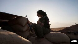 Женщина-боевик в Сирии. Иллюстративное фото.