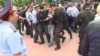 Задержание репортера Азаттыка Петра Троценко неподалеку от акции протеста против выборов. Алматы, 9 июня 2019 года.