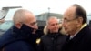 Germany -- Hans-Dietrich Genscher (R) of the liberal Free Democratic Party (FDP) welcomes Russian former oil tycoon Mikhail Khodorkovsky at Berlin's Schonefeld airport, December 20, 2013
