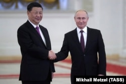 Си Цзиньпин и Владимир Путин.