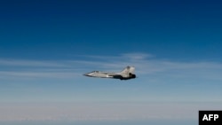 Imagine din 19 septembrie 2025, publicată de Forțele Aeriene ale Suediei, în care un avion de vânătoare rusesc MIG-31 zboară deasupra Mării Baltice după ce a încălcat spațiul aerian estonian.