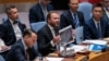 În imagine, ministrul de externe al Estoniei, Margus Tsahkna (în centru, cu o fotografie în mână), în timpul ședinței Consiliului de Securitate al ONU.