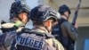 Descinderile sunt realizate de INI, în comun cu procurorii PCCOCS, mascații din Brigada de Poliție cu Destinație Specială „Fulger” și angajații Serviciului de Informații și Securitate. Imagine simbol