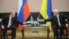 Владимир Путин и Николай Азаров, Киев, 27 апреля 2010 г