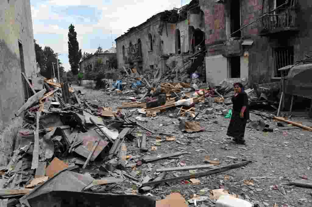 A street in Gori is littered with rubble after a Russian air strike.