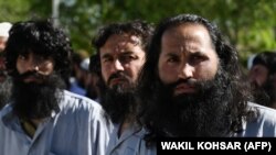 Одни из последних пленных талибов, захваченных американскими войсками в Афганистане. База Баграм. 26 мая 2021 года.