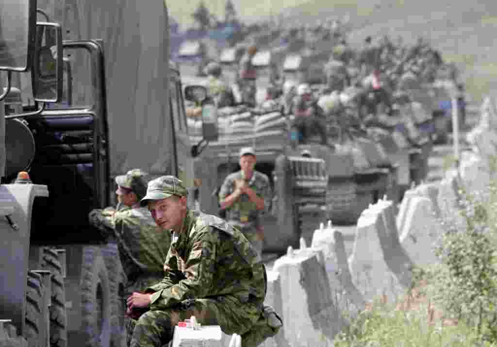 Russian soldiers take a break as they approach Tskhinvali on August 9.