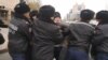 Полицейские задерживают Дулата Агадила в Нур-Султане. 26 октября 2019 года.