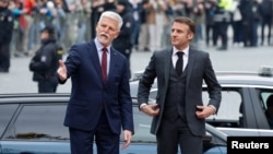 "Is this or is it not our war? Can we look away in the belief that we can let things run their course?” French President Emmanuel Macron said while visiting Prague on March 5. 