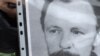 Фотографія Юрія Литвина, яку тримали учасники акції з відзначення 20-річчя перепоховання Василя Стуса, Юрія Литвина і Олекси Тихого. Київ, 19 листопада 2009 року 