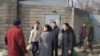 Родственники помещенных под стражу накануне митингов 22 февраля и в день протестных акций стоят у спецприемника для административно арестованных. Алматы, 24 февраля 2020 года. 