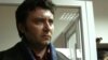 Журналист Валерий Сурганов в здании Медеуского районного суда в день оглашения приговора по своему делу. Алматы, 7 ноября 2011 года.