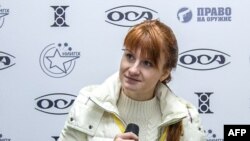 Мария Бутина выступает на пресс-конференции в Москве, октябрь, 2013 год