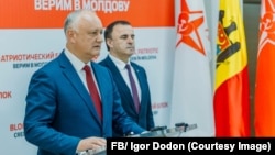 Doi dintre liderii „Blocului Patriotic”, Igor Dodon și Vasile Tarlev, într-o apariție în fața presei la Chișinău, pe 22 septembrie