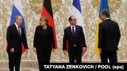 Володимир Путін, Анґела Меркель, Франсуа Олланд і Петро Порошенко (л -> п) під час зустрічі в Мінську 11 лютого 2015 року