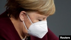Cancelarul Angela Merkel spune că nu va accepta ca vaccinarea COVID să devină obligatorie.